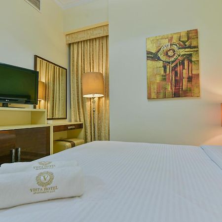 Vista Hotel Apartments Deluxe Dubai Esterno foto