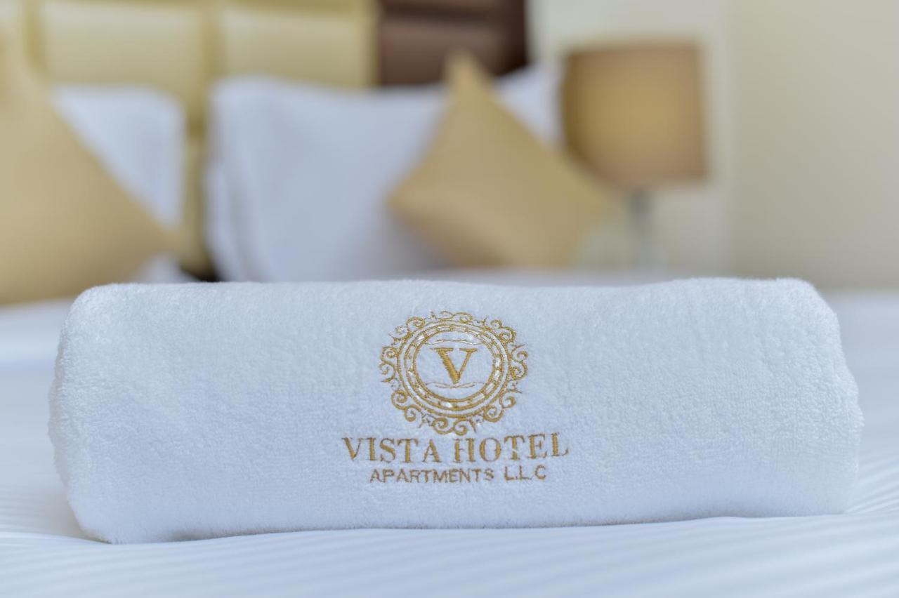 Vista Hotel Apartments Deluxe Dubai Esterno foto