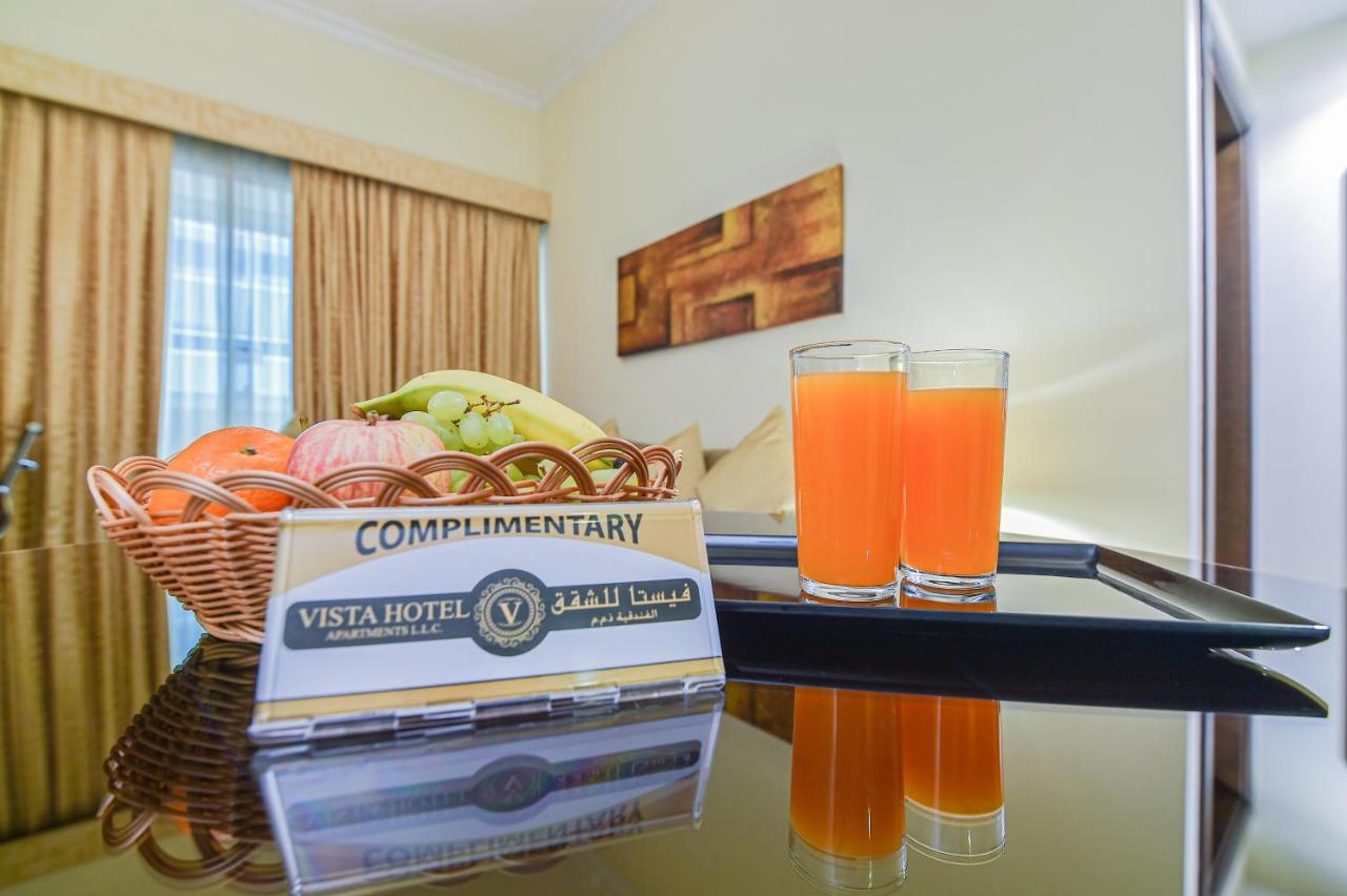 Vista Hotel Apartments Deluxe Dubai Esterno foto