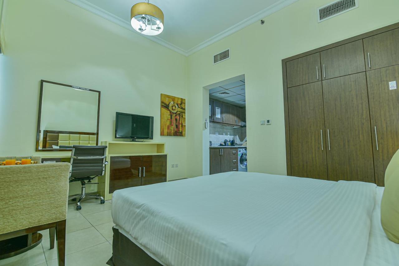 Vista Hotel Apartments Deluxe Dubai Esterno foto