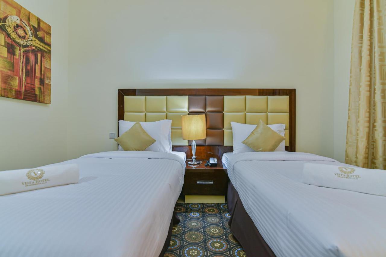 Vista Hotel Apartments Deluxe Dubai Esterno foto